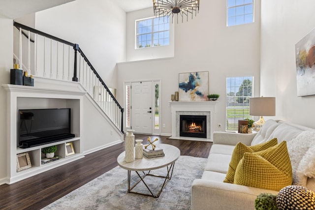 3037 Wilcot Way, Franklin, TN 37069 - living area with stairway, wood finished floors, a high ceiling, and healthy amount of natural light