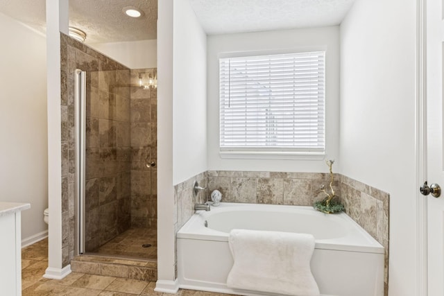 3037 Wilcot Way, Franklin, TN 37069 - full bath with a garden tub, a textured ceiling, a shower stall, and tile patterned floors