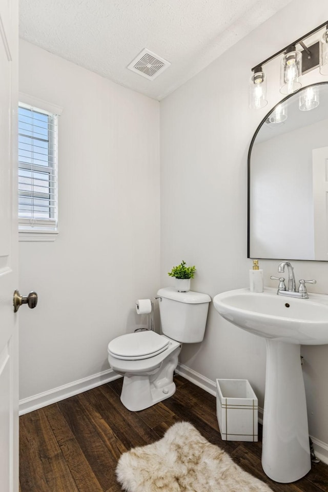 3037 Wilcot Way, Franklin, TN 37069 - half bathroom featuring wood finished floors and a textured ceiling