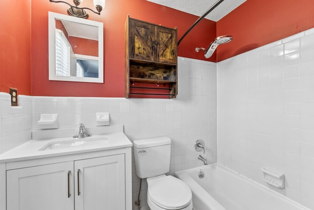 353 Greenleaf Ln, Clarksville, TN 37040 - full bathroom with vanity, tile walls, shower / washtub combination, and a wainscoted wall