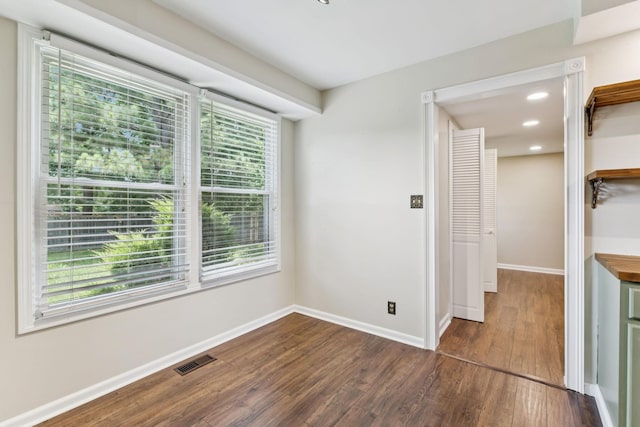 353 Greenleaf Ln, Clarksville, TN 37040 - empty room featuring dark wood-type flooring and recessed lighting