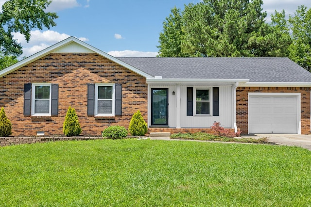 353 Greenleaf Ln, Clarksville, TN 37040 - ranch-style house with brick siding, a garage, roof with shingles, and a front yard