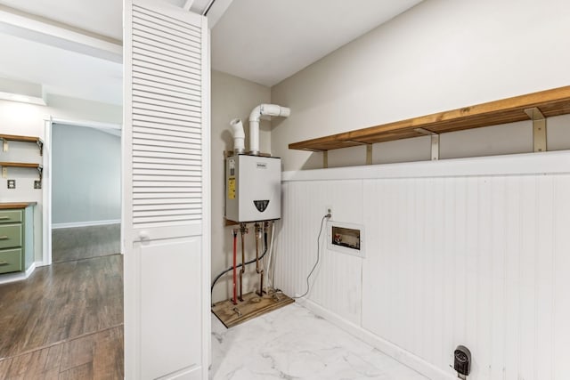 353 Greenleaf Ln, Clarksville, TN 37040 - laundry area featuring washer hookup and tankless water heater