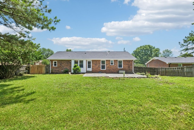353 Greenleaf Ln, Clarksville, TN 37040 - rear view of house featuring a patio, a fenced backyard, and brick siding