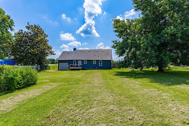 5334 Shelbyville Pike, Christiana, TN 37037 - back of house with a wooden deck, a garage, driveway, and a metal roof
