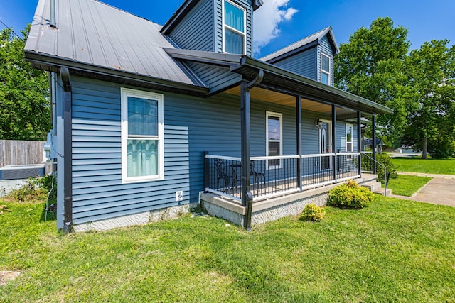5334 Shelbyville Pike, Christiana, TN 37037 - view of side of home with a porch, a yard, and a metal roof