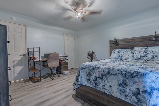 5334 Shelbyville Pike, Christiana, TN 37037 - bedroom featuring wood finished floors, a desk, and a ceiling fan