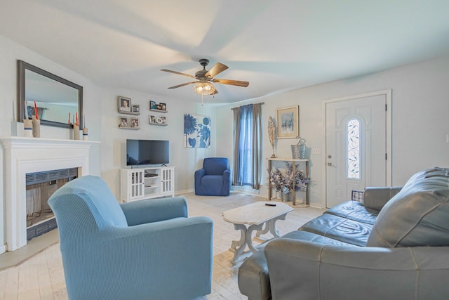 5334 Shelbyville Pike, Christiana, TN 37037 - living room featuring a ceiling fan, a fireplace, and light wood-type flooring