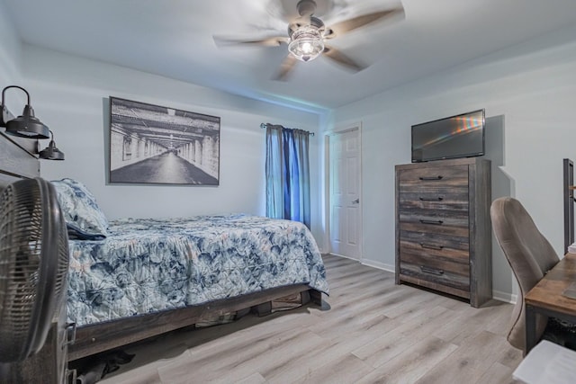 5334 Shelbyville Pike, Christiana, TN 37037 - bedroom with wood finished floors, ceiling fan, and a desk