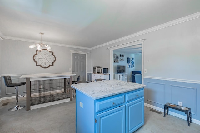 5334 Shelbyville Pike, Christiana, TN 37037 - kitchen with a chandelier, ornamental molding, blue cabinets, a center island, and light stone counters