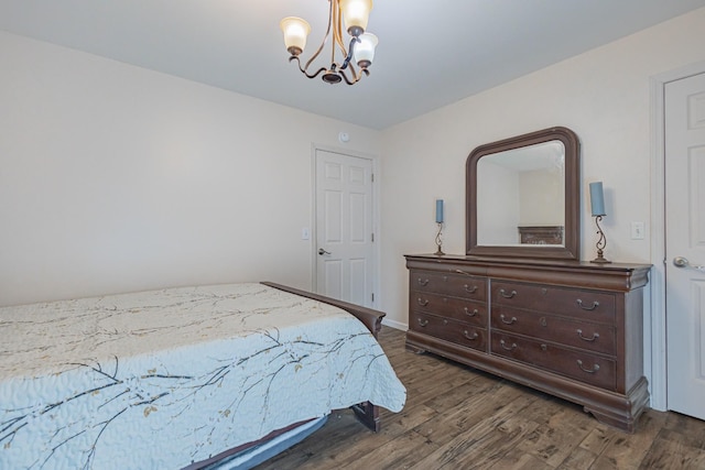 5334 Shelbyville Pike, Christiana, TN 37037 - bedroom featuring a chandelier and dark wood-type flooring