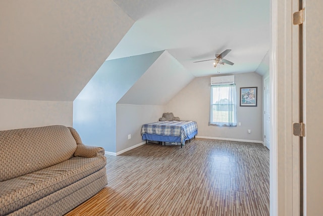 5334 Shelbyville Pike, Christiana, TN 37037 - bedroom with wood finished floors, lofted ceiling, a ceiling fan, and a wall mounted AC
