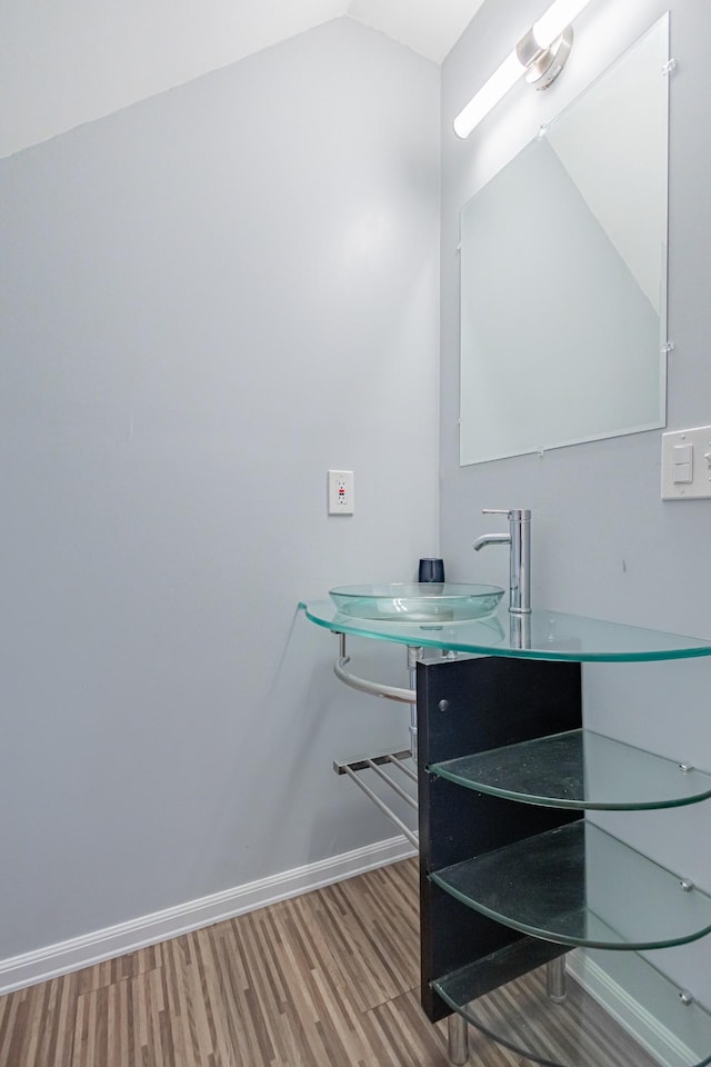 5334 Shelbyville Pike, Christiana, TN 37037 - bathroom featuring wood finished floors and lofted ceiling