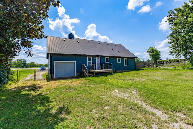 5334 Shelbyville Pike, Christiana, TN 37037 - back of house featuring a deck, a metal roof, a garage, driveway, and a chimney