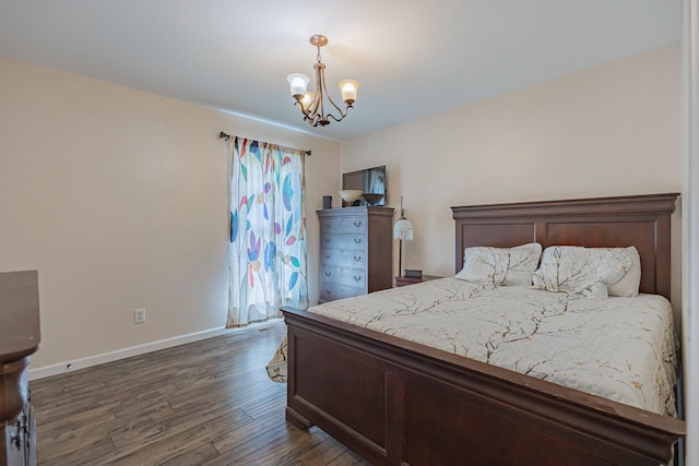 5334 Shelbyville Pike, Christiana, TN 37037 - bedroom with a chandelier and dark wood-style floors