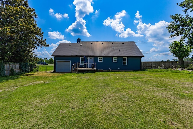 5334 Shelbyville Pike, Christiana, TN 37037 - rear view of house with a fenced backyard, a deck, a metal roof, and a garage