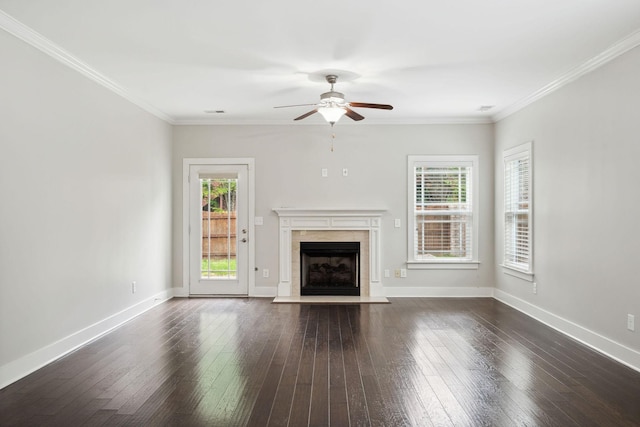 1000 Swanson Ln, Franklin, TN 37064 - unfurnished living room featuring a ceiling fan, a high end fireplace, dark wood-style floors, and crown molding
