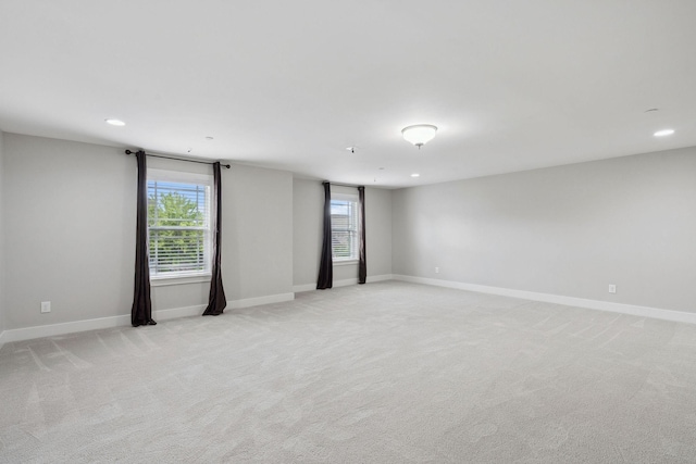 1000 Swanson Ln, Franklin, TN 37064 - empty room with plenty of natural light, light colored carpet, and recessed lighting
