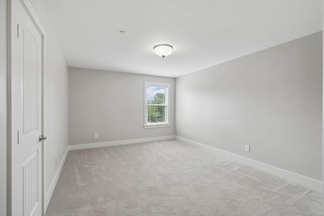 1000 Swanson Ln, Franklin, TN 37064 - carpeted empty room with baseboards