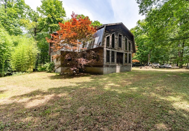 8116 Hixson Springs Rd, Signal Mountain, TN 37377 - rear view of house with a gambrel roof, a yard, log siding, and a metal roof