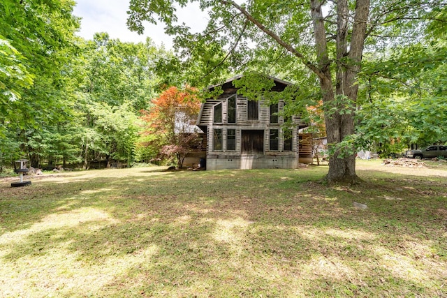 8116 Hixson Springs Rd, Signal Mountain, TN 37377 - back of house featuring a lawn