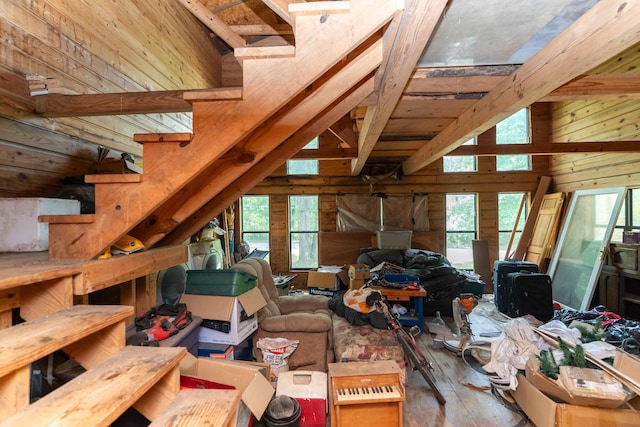 8116 Hixson Springs Rd, Signal Mountain, TN 37377 - living room with wood-type flooring, beamed ceiling, wood walls, and high vaulted ceiling