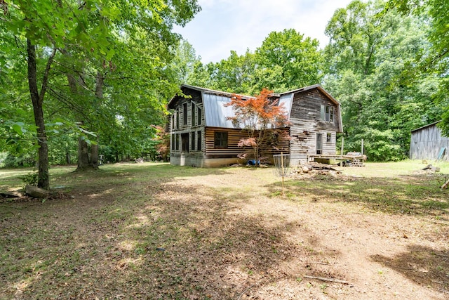 8116 Hixson Springs Rd, Signal Mountain, TN 37377 - rear view of property with a gambrel roof, log siding, and a metal roof