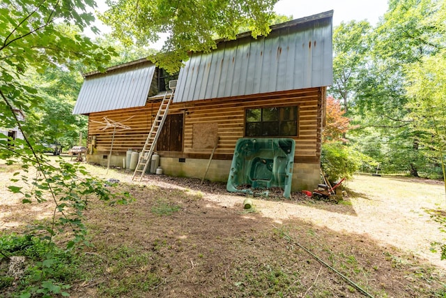 8116 Hixson Springs Rd, Signal Mountain, TN 37377 - back of property with a metal roof and crawl space