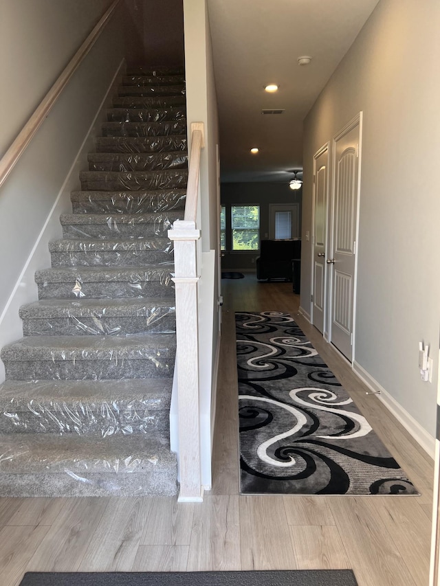 5727 Dockside Dr, Rockvale, TN 37153 - staircase with wood finished floors, ceiling fan, and recessed lighting