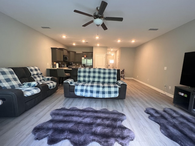 5727 Dockside Dr, Rockvale, TN 37153 - living room with light wood finished floors, ceiling fan, and recessed lighting