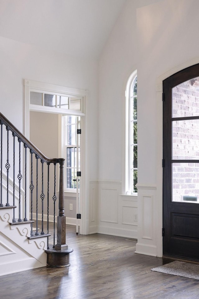 1825 Barnstaple Ln, Brentwood, TN 37027 - entryway with plenty of natural light, a wainscoted wall, stairs, wood finished floors, and lofted ceiling