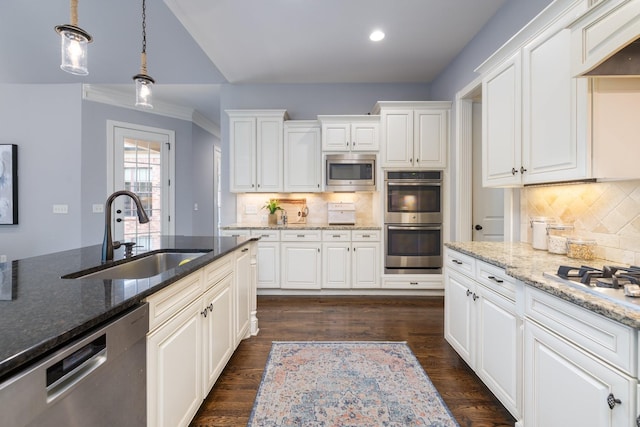 1825 Barnstaple Ln, Brentwood, TN 37027 - kitchen with appliances with stainless steel finishes, decorative backsplash, white cabinets, and recessed lighting