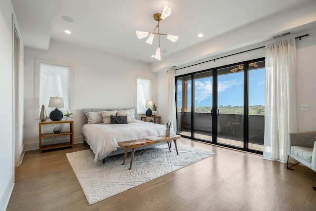 2118 Cliff Dr, Nashville, TN 37218 - bedroom featuring access to exterior, wood finished floors, and recessed lighting