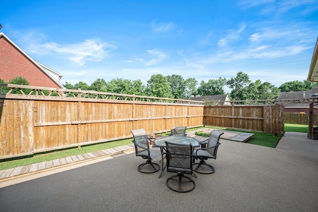 2606 Battleground Dr, Murfreesboro, TN 37129 - fenced backyard with a patio and outdoor dining area