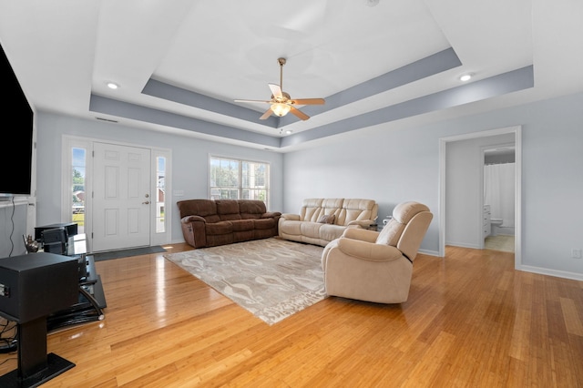 2606 Battleground Dr, Murfreesboro, TN 37129 - living area featuring a raised ceiling, light wood finished floors, a ceiling fan, and recessed lighting