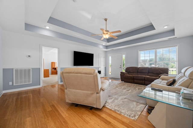 2606 Battleground Dr, Murfreesboro, TN 37129 - living area with a raised ceiling, light wood-style floors, ceiling fan, healthy amount of natural light, and recessed lighting