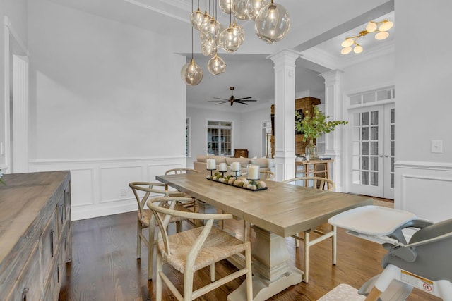 1803 Benziger Ter, Brentwood, TN 37027 - dining area with decorative columns, ornamental molding, ceiling fan, dark wood-style flooring, and a decorative wall