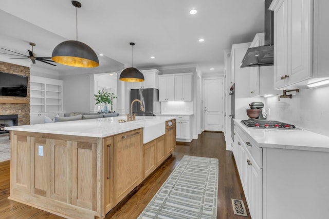 1803 Benziger Ter, Brentwood, TN 37027 - kitchen featuring appliances with stainless steel finishes, dark wood-type flooring, ceiling fan, light countertops, and recessed lighting