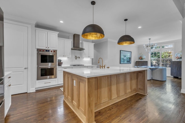 1803 Benziger Ter, Brentwood, TN 37027 - kitchen featuring stainless steel double oven, wall chimney range hood, recessed lighting, light countertops, and dark wood-type flooring
