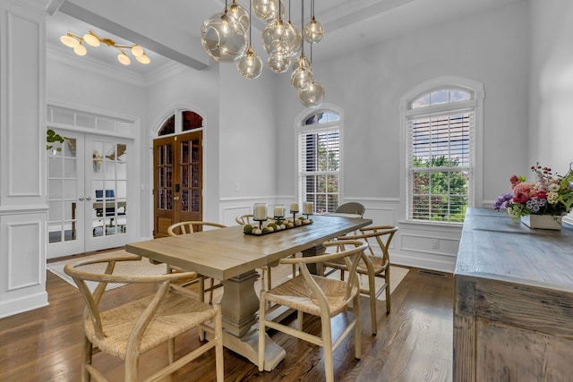 1803 Benziger Ter, Brentwood, TN 37027 - dining room featuring french doors, dark wood finished floors, a wainscoted wall, a high ceiling, and crown molding
