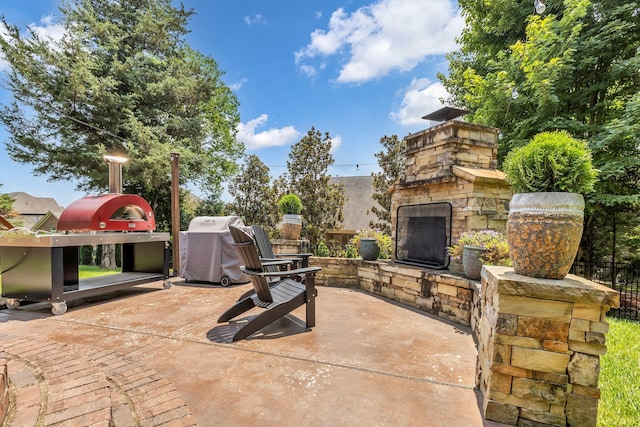 1803 Benziger Ter, Brentwood, TN 37027 - view of patio / terrace featuring an outdoor stone fireplace and area for grilling