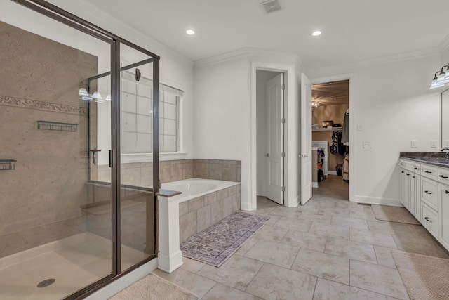 1803 Benziger Ter, Brentwood, TN 37027 - bathroom featuring vanity, a shower stall, a garden tub, a spacious closet, and recessed lighting