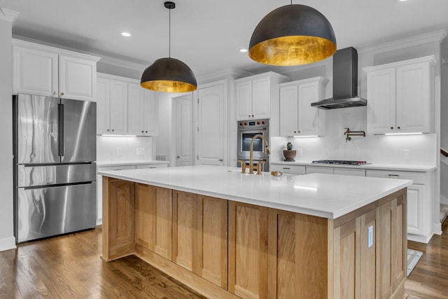 1803 Benziger Ter, Brentwood, TN 37027 - kitchen featuring appliances with stainless steel finishes, wall chimney range hood, crown molding, dark wood finished floors, and white cabinets