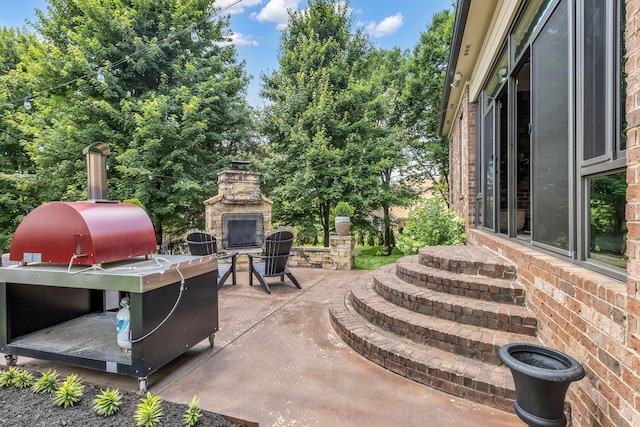 1803 Benziger Ter, Brentwood, TN 37027 - view of patio with an outdoor stone fireplace and area for grilling