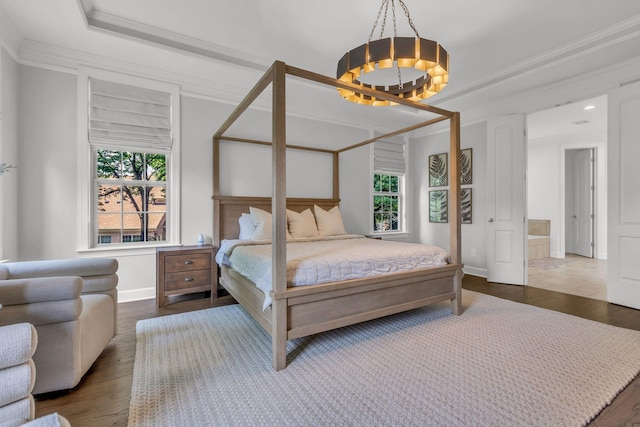1803 Benziger Ter, Brentwood, TN 37027 - bedroom featuring a chandelier, multiple windows, crown molding, and wood finished floors