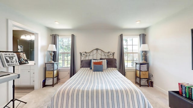 3428 Pepper Glendale Dr, Murfreesboro, TN 37128 - bedroom with multiple windows, ensuite bathroom, and light colored carpet