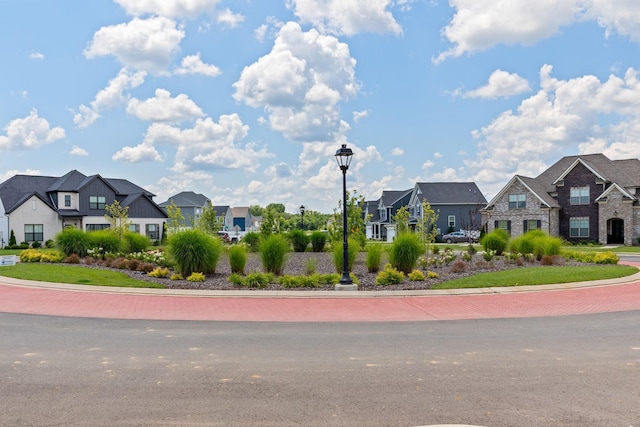 3428 Pepper Glendale Dr, Murfreesboro, TN 37128 - view of asphalt road featuring a residential view, street lights, and curbs