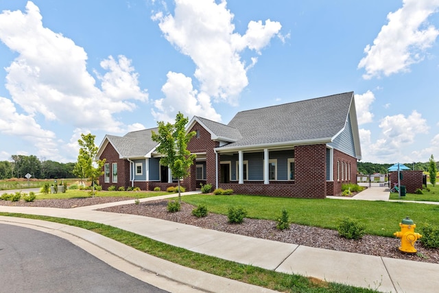 3428 Pepper Glendale Dr, Murfreesboro, TN 37128 - view of front of house featuring brick siding, a front lawn, and a shingled roof