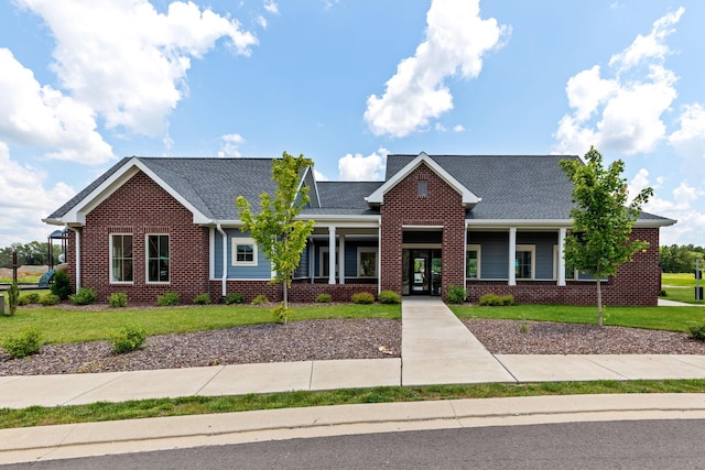 3428 Pepper Glendale Dr, Murfreesboro, TN 37128 - craftsman-style house featuring brick siding, a front lawn, a porch, and a shingled roof