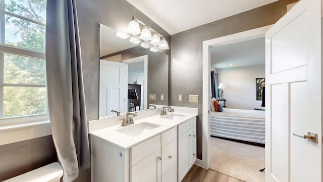 3428 Pepper Glendale Dr, Murfreesboro, TN 37128 - ensuite bathroom with double vanity and wood finished floors